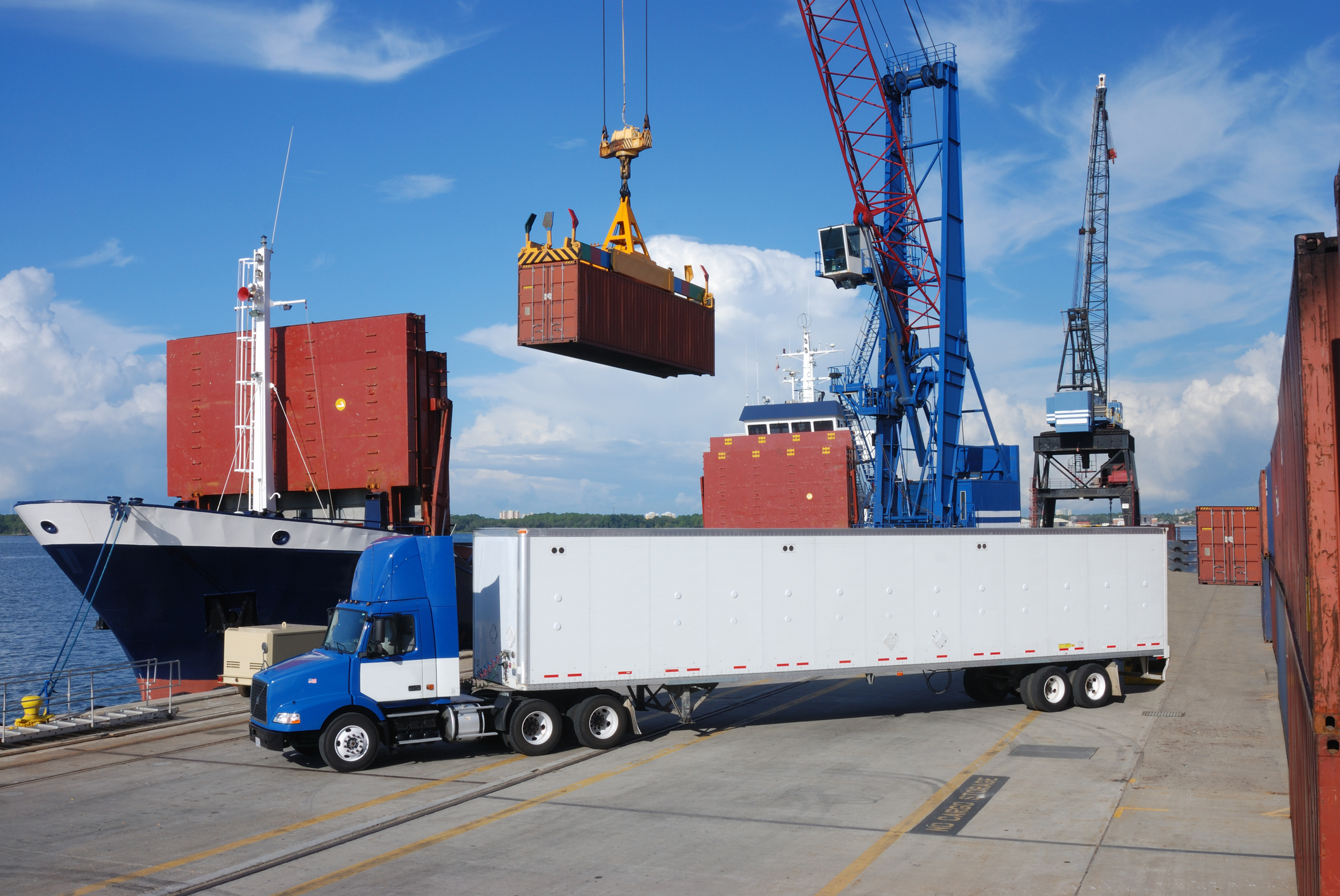 Seaport logistics with cranes and containers